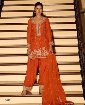 Orange chinon free size stitched suit with embroidered beats  1