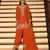 Orange chinon free size stitched suit with embroidery & beats work