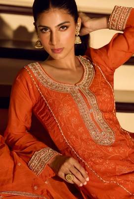 Orange chinon free size stitched suit with embroidered beats  2
