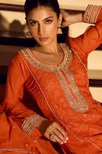 Orange chinon free size stitched suit with embroidered beats 