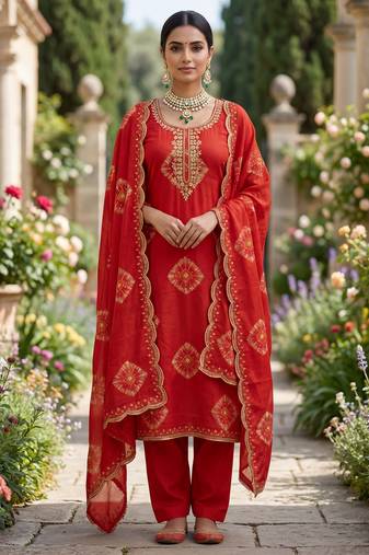 Orange silk unstitched suit with printed & khatli work