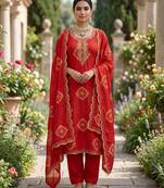 Orange silk unstitched suit with printed & khatli work