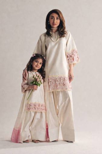 Mom-daughter combo: natural silk suit with moti hand work