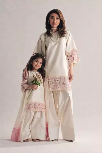 Mom-daughter combo: natural silk suit with moti hand work