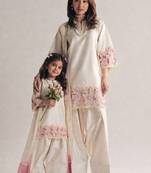 Mom-daughter combo: natural silk suit with moti hand work