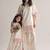 Mom-daughter combo: natural silk suit with moti hand work