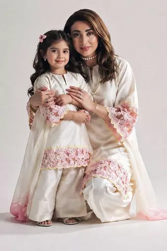 Mom-daughter combo: natural silk suit with moti hand work