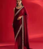 Maroon rangoli silk embroidered lace work party wear saree