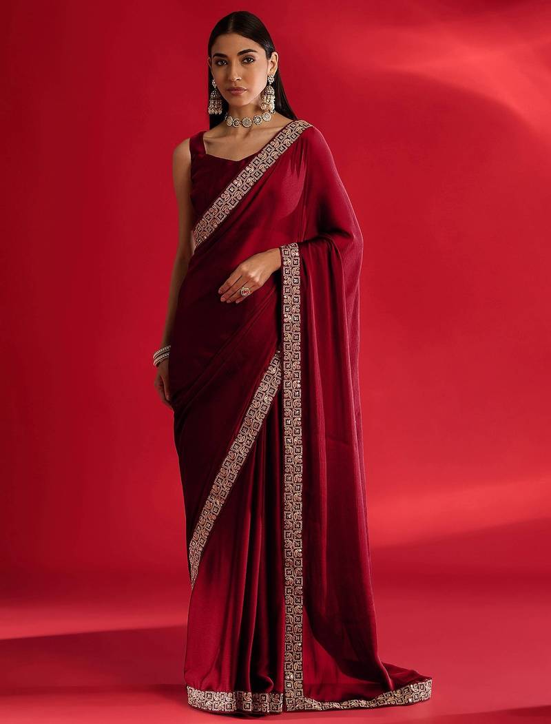 Maroon rangoli silk embroidered lace work party wear saree