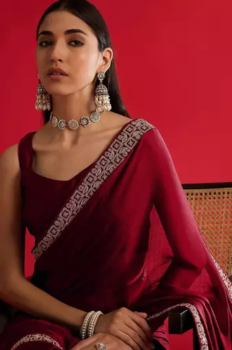 Maroon rangoli silk embroidered lace work party wear saree