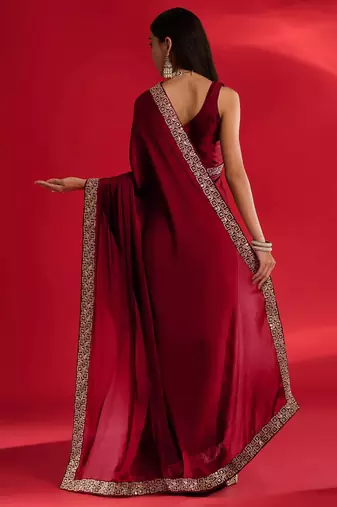 Maroon rangoli silk embroidered lace work party wear saree
