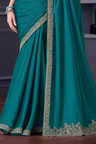Teal silk blend chiffon embroidered saree with unstitched blouse piece