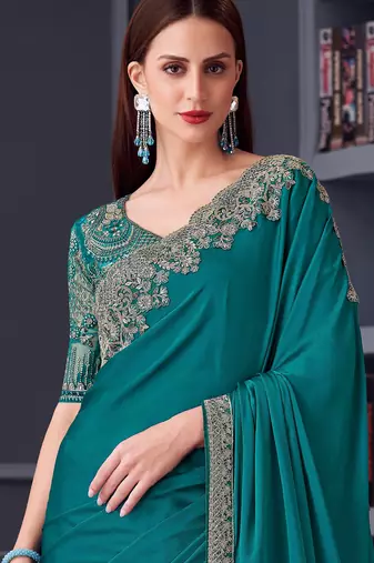 Teal silk blend chiffon embroidered saree with unstitched blouse piece