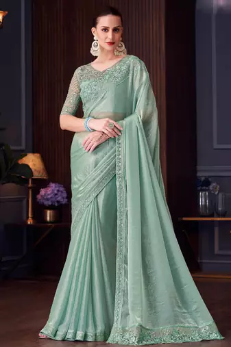 Sea green soft silk blend embroidered saree with unstitched blouse piece