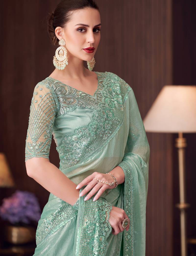 Sea green soft silk blend embroidered saree with unstitched blouse piece