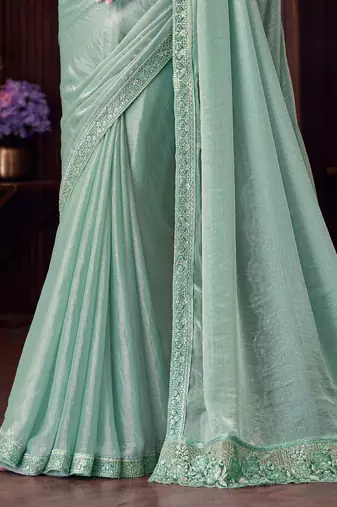 Sea green soft silk blend embroidered saree with unstitched blouse piece