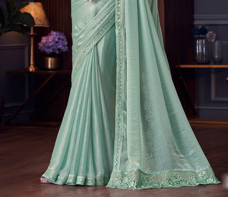 Sea green soft silk blend embroidered saree with unstitched blouse piece