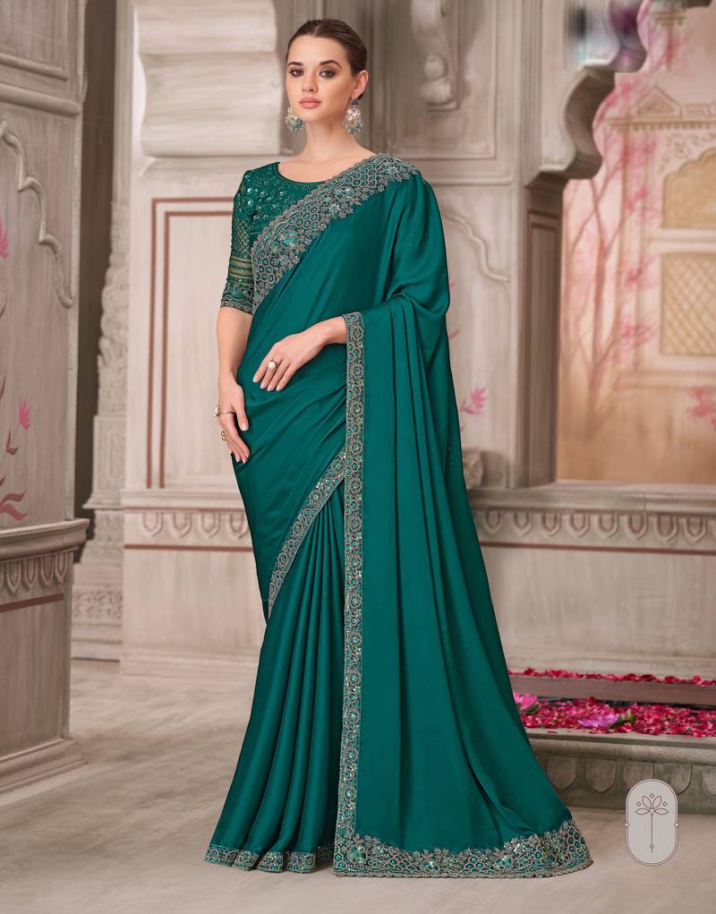 Teal soft silk blend embroidered saree with unstitched blouse piece