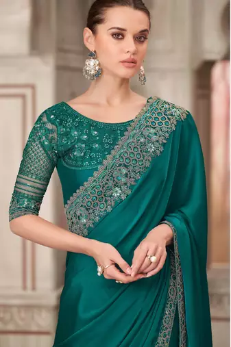 Teal soft silk blend embroidered saree with unstitched blouse piece