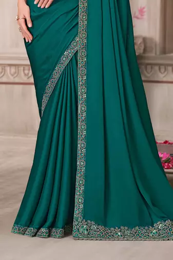 Teal soft silk blend embroidered saree with unstitched blouse piece