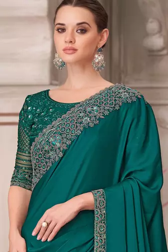 Teal soft silk blend embroidered saree with unstitched blouse piece