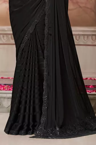 Black soft silk blend embroidered saree with unstitched blouse piece