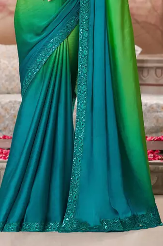 Sea green soft silk blend embroidered saree with unstitched blouse piece