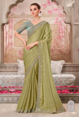Pista soft silk blend embroidered saree with unstitched blouse piece 1