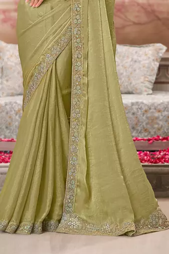 Pista soft silk blend embroidered saree with unstitched blouse piece