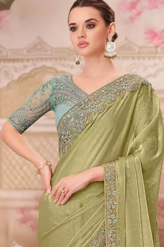 Pista soft silk blend embroidered saree with unstitched blouse piece