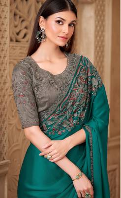 Turquoise satin silk blend embroidered saree with unstitched blouse piece 4