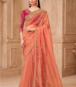 Orange georgette embroidered saree with unstitched blouse piece