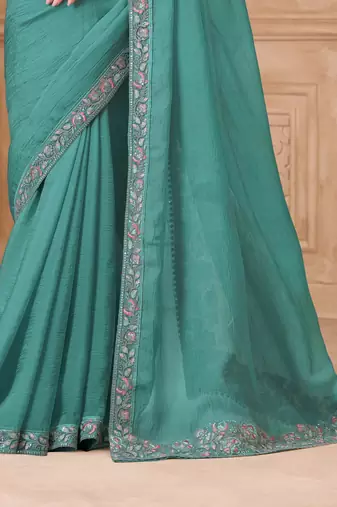 Sea green satin embroidered saree with unstitched blouse piece