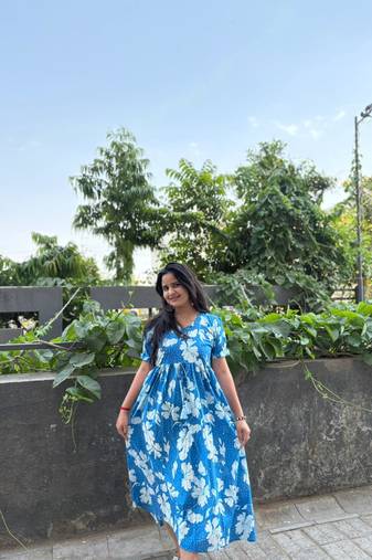 Women's Rayon Floral Printed Designer Round Neck Blue Flared Gown Dress