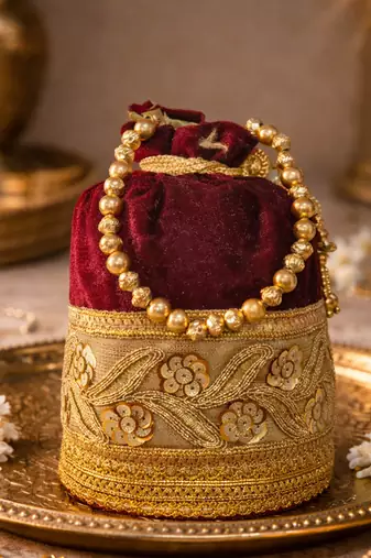 Maroon silk designer potli bag for women with golden embroidery 