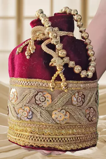 Maroon silk designer potli bag for women with golden embroidery 