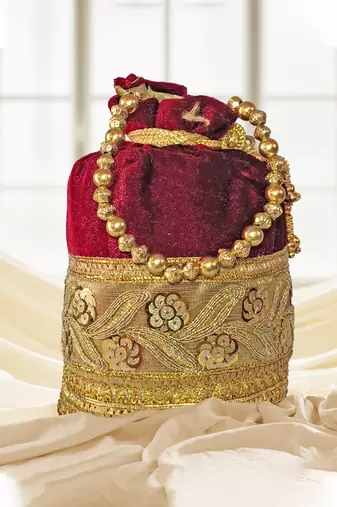 Maroon silk designer potli bag for women with golden embroidery 