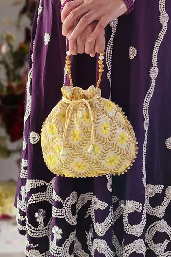 Yellow embroidered potli bags – handcrafted wedding potli with beads