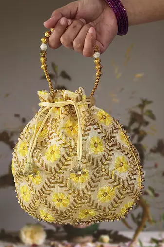 Yellow embroidered potli bags – handcrafted wedding potli with beads