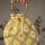 Yellow embroidered potli bags – handcrafted wedding potli with beads