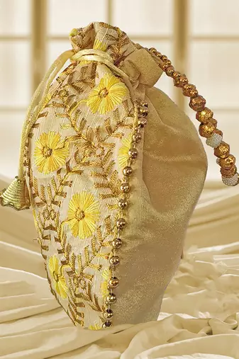 Yellow embroidered potli bags – handcrafted wedding potli with beads