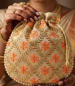 Red embroidered potli bags – handcrafted wedding potli with beads
