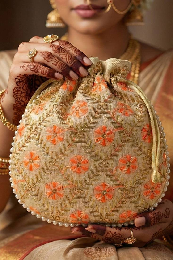 Red embroidered potli bags – handcrafted wedding potli with beads