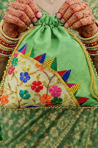 Green embroidered potli bags – handcrafted wedding potli with beads 