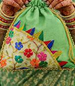 Green embroidered potli bags – handcrafted wedding potli with beads 