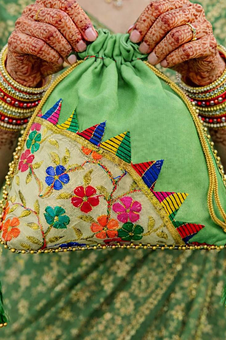 Green embroidered potli bags – handcrafted wedding potli with beads 