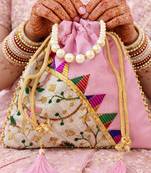 Pink embroidered potli bags – handcrafted wedding potli with beads