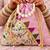 Pink embroidered potli bags – handcrafted wedding potli with beads