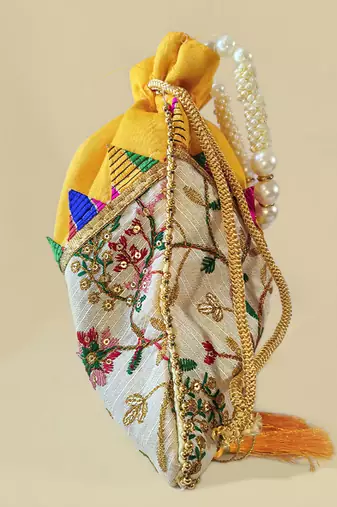 Yellow embroidered potli bags – handcrafted wedding potli with beads 