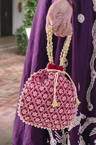 Maroon embroidered potli bags – handcrafted wedding potli with beads 